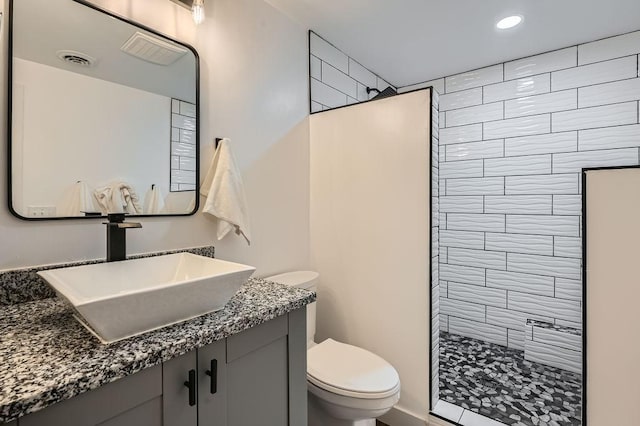 10034 191st Ave NW, Elk River, MN 55330 - full bathroom with toilet, a walk in shower, vanity, and recessed lighting