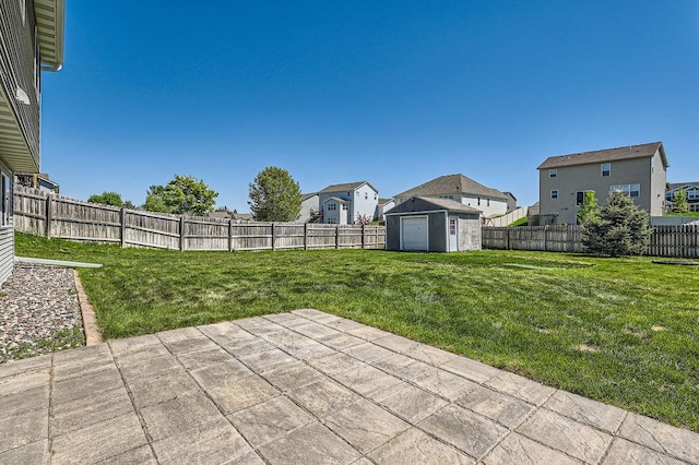 10034 191st Ave NW, Elk River, MN 55330 - view of yard featuring a patio, a storage unit, an outbuilding, and a residential view
