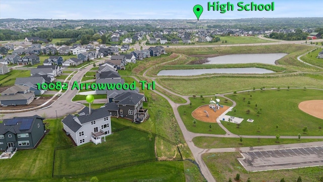 10082 Arrowwood Trl, Woodbury, MN 55129 - aerial view of residential area with a nearby body of water