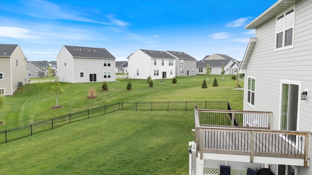 10082 Arrowwood Trl, Woodbury, MN 55129 - view of yard with a residential view and a deck