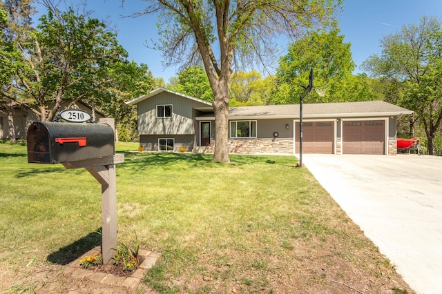 2510 Conifer Ave, Alexandria, MN 56308 - tri-level home with a garage, driveway, and a front lawn