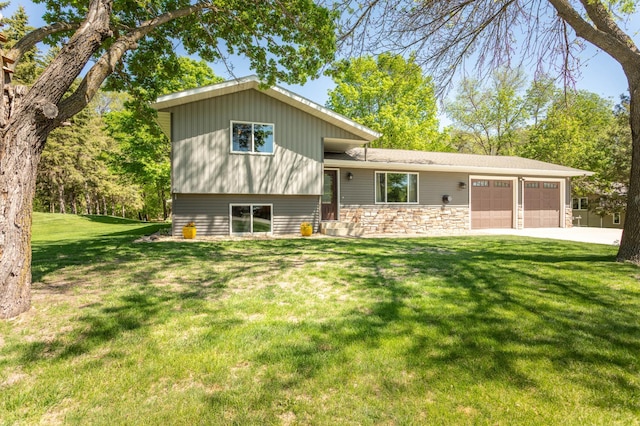 2510 Conifer Ave, Alexandria, MN 56308 - view of front of property with a garage, a front lawn, concrete driveway, and stone siding
