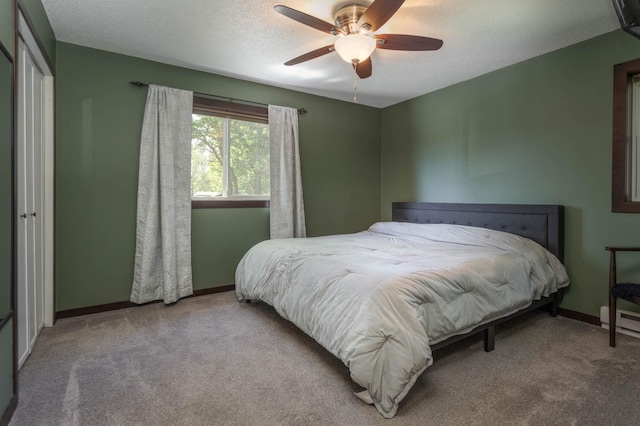 2510 Conifer Ave, Alexandria, MN 56308 - bedroom featuring carpet flooring, baseboards, a textured ceiling, and ceiling fan