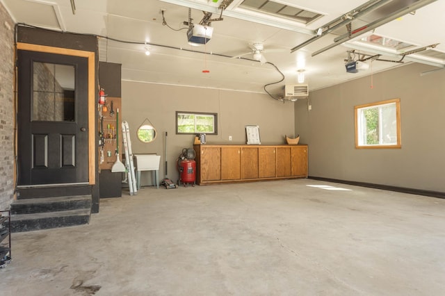 2510 Conifer Ave, Alexandria, MN 56308 - garage featuring a garage door opener
