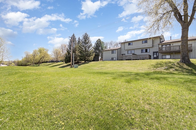 6872 Grenwich Ln N Unit 0, Oakdale, MN 55128 - view of green lawn with a wooden deck and stairs