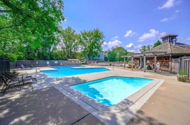 6872 Grenwich Ln N Unit 0, Oakdale, MN 55128 - community pool with a patio area