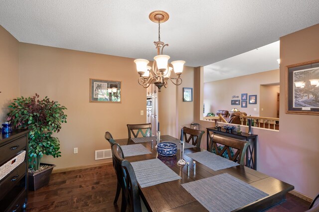 14573 Krypton St NW, Ramsey, MN 55303 - dining room featuring dark wood finished floors, a chandelier, and baseboards