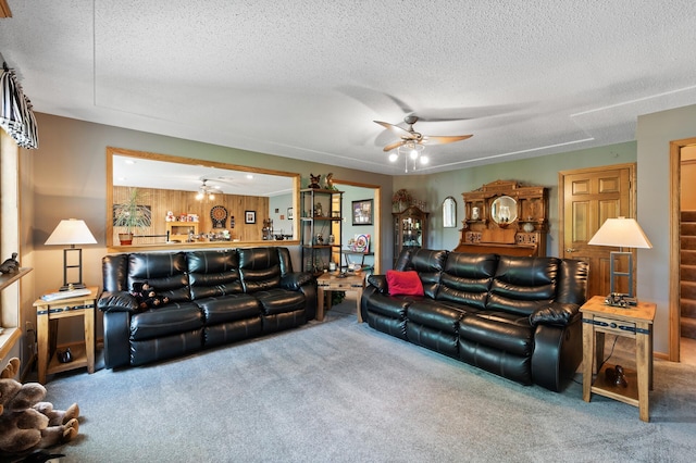14573 Krypton St NW, Ramsey, MN 55303 - living room with a ceiling fan, carpet floors, and a textured ceiling