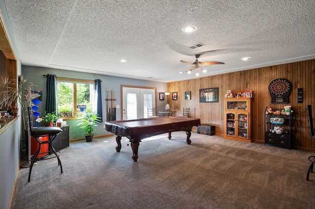 14573 Krypton St NW, Ramsey, MN 55303 - recreation room featuring billiards, carpet flooring, a textured ceiling, ceiling fan, and wooden walls