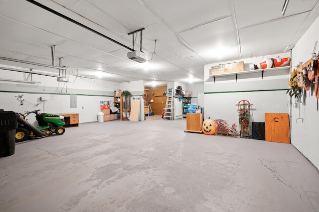 14573 Krypton St NW, Ramsey, MN 55303 - garage featuring a garage door opener and electric panel