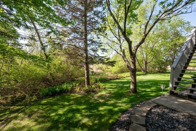14573 Krypton St NW, Ramsey, MN 55303 - view of green lawn featuring stairs