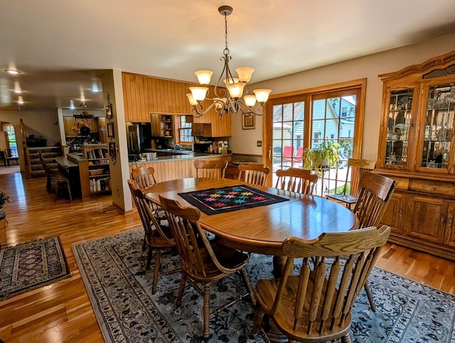 617 9th St, Montevideo, MN 56265 - dining room with a chandelier, healthy amount of natural light, and wood finished floors