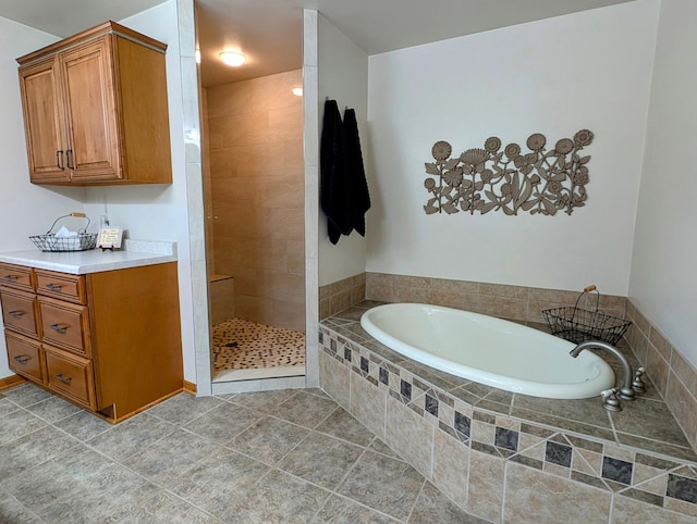 617 9th St, Montevideo, MN 56265 - full bath with a garden tub, a tile shower, and tile patterned flooring
