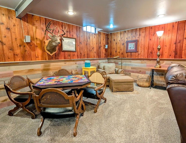 617 9th St, Montevideo, MN 56265 - carpeted dining area featuring wood walls
