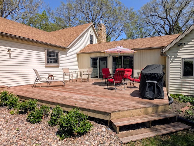 617 9th St, Montevideo, MN 56265 - wooden deck with a grill