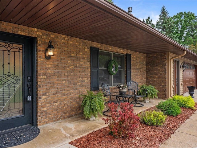 30703 Lakeview Dr, Breezy Point, MN 56472 - property entrance with covered porch and brick siding