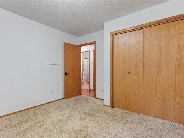 30703 Lakeview Dr, Breezy Point, MN 56472 - unfurnished bedroom featuring carpet floors, a closet, and baseboards