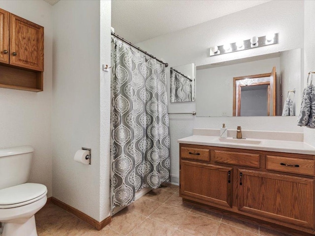 30703 Lakeview Dr, Breezy Point, MN 56472 - full bathroom featuring vanity, toilet, tile patterned floors, baseboards, and curtained shower