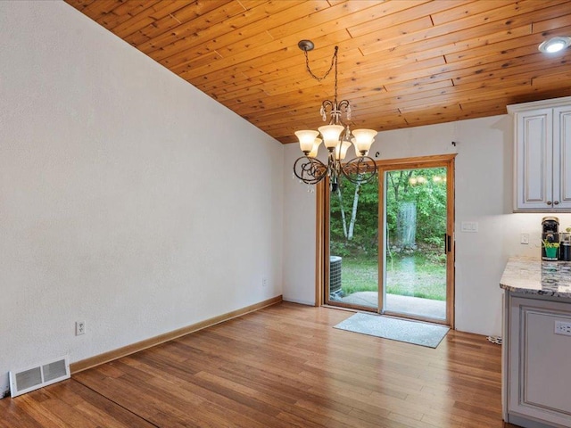 30703 Lakeview Dr, Breezy Point, MN 56472 - unfurnished dining area featuring a chandelier, light wood-style flooring, wood ceiling, baseboards, and lofted ceiling