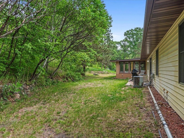 30703 Lakeview Dr, Breezy Point, MN 56472 - view of yard featuring a sunroom