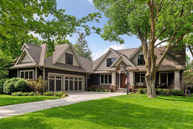 154 Babcock Ln, Wayzata, MN 55391 - craftsman-style house featuring a front yard, concrete driveway, a garage, and stone siding