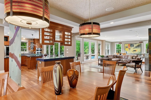 154 Babcock Ln, Wayzata, MN 55391 - dining space featuring light wood finished floors and recessed lighting