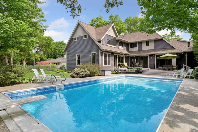 154 Babcock Ln, Wayzata, MN 55391 - outdoor pool featuring an outdoor living space, a patio area, and a diving board