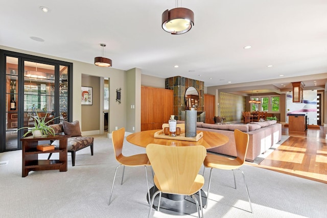154 Babcock Ln, Wayzata, MN 55391 - dining room with light carpet, recessed lighting, and baseboards