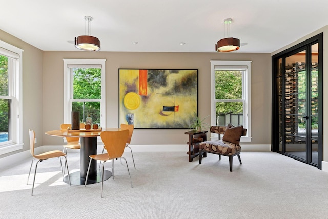 154 Babcock Ln, Wayzata, MN 55391 - dining area with carpet, healthy amount of natural light, and baseboards