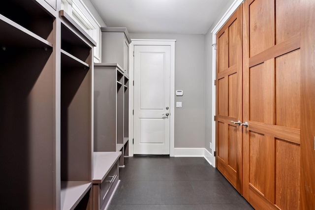 154 Babcock Ln, Wayzata, MN 55391 - mudroom with baseboards and dark tile patterned floors