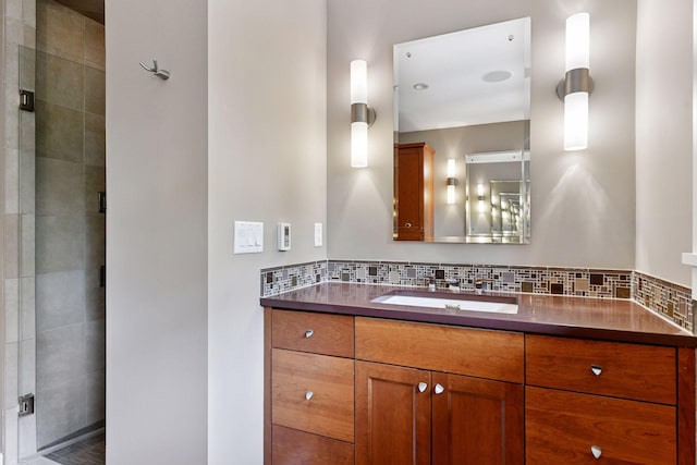 154 Babcock Ln, Wayzata, MN 55391 - full bathroom featuring vanity, a stall shower, and backsplash