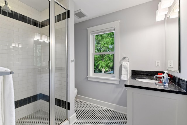 154 Babcock Ln, Wayzata, MN 55391 - bathroom featuring vanity, baseboards, a shower stall, toilet, and tile patterned floors