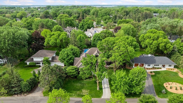 154 Babcock Ln, Wayzata, MN 55391 - drone / aerial view of a heavily wooded area