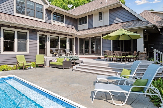 154 Babcock Ln, Wayzata, MN 55391 - rear view of house featuring roof with shingles, french doors, an outdoor pool, and outdoor dining space