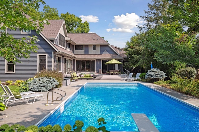 154 Babcock Ln, Wayzata, MN 55391 - swimming pool featuring a patio area and a diving board