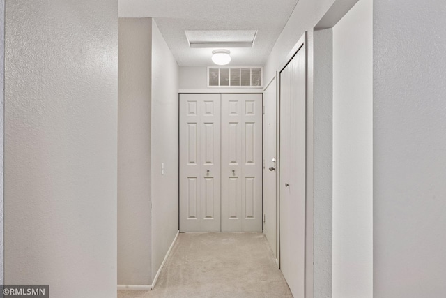 11031 Oregon Cir Unit 58, Bloomington, MN 55438 - hallway featuring light carpet