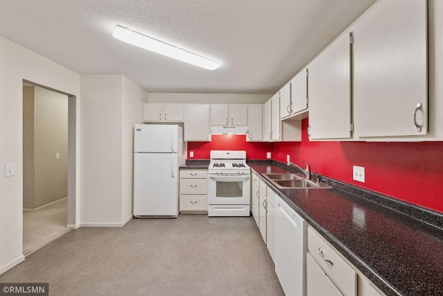 11031 Oregon Cir Unit 58, Bloomington, MN 55438 - kitchen featuring white appliances, a sink, under cabinet range hood, dark countertops, and a textured ceiling