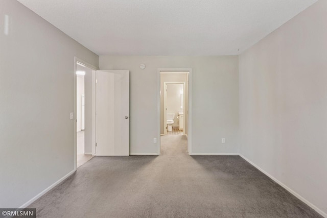 11031 Oregon Cir Unit 58, Bloomington, MN 55438 - spare room with carpet flooring and baseboards