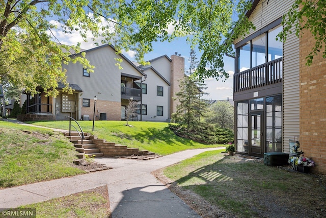 11031 Oregon Cir Unit 58, Bloomington, MN 55438 - view of property's community with a lawn