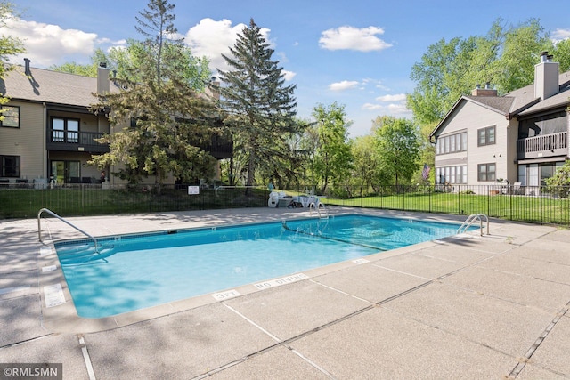 11031 Oregon Cir Unit 58, Bloomington, MN 55438 - community pool with fence and a patio area