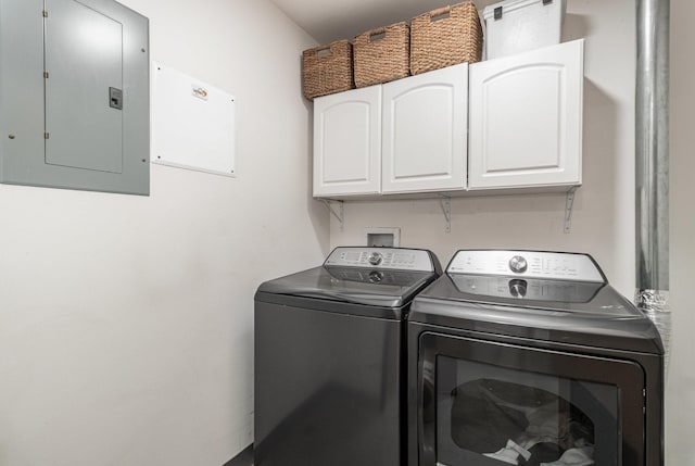 730 Stinson Blvd Unit 406, Minneapolis, MN 55413 - washroom with electric panel, cabinet space, and independent washer and dryer