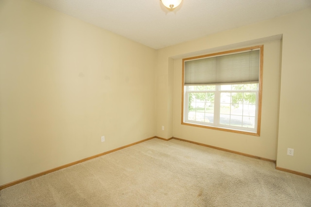 1675 Skywood Ln, Eagan, MN 55122 - carpeted empty room featuring baseboards
