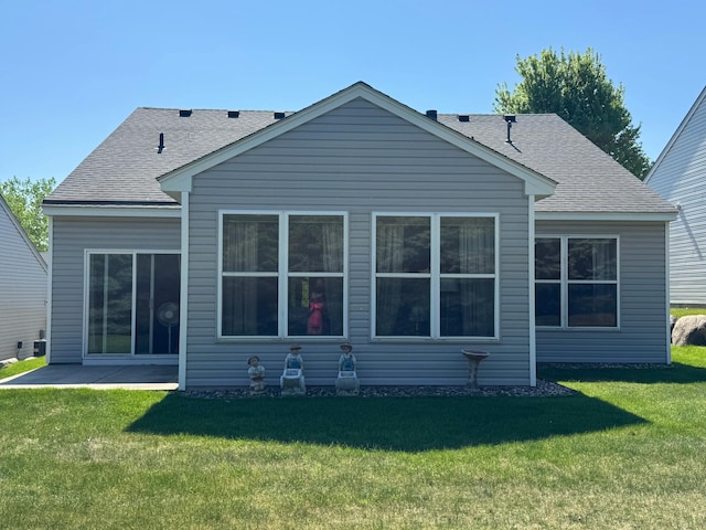 1675 Skywood Ln, Eagan, MN 55122 - back of property with a yard and roof with shingles