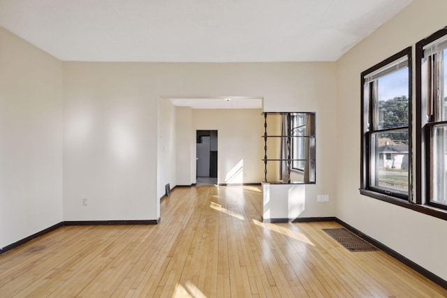 1264 Snelling Ave N, Saint Paul, MN 55108 - empty room featuring light wood-type flooring and baseboards