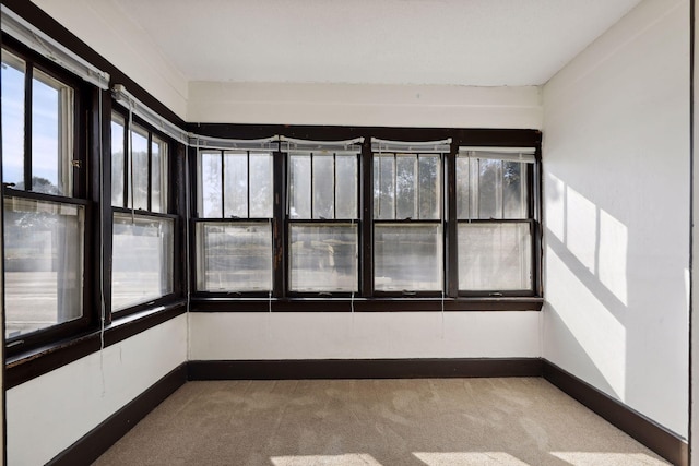 1264 Snelling Ave N, Saint Paul, MN 55108 - unfurnished sunroom with plenty of natural light