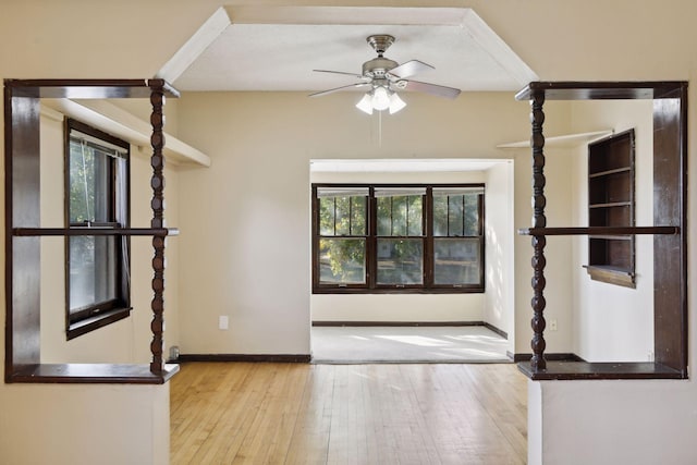 1264 Snelling Ave N, Saint Paul, MN 55108 - empty room featuring hardwood / wood-style flooring, ceiling fan, and baseboards