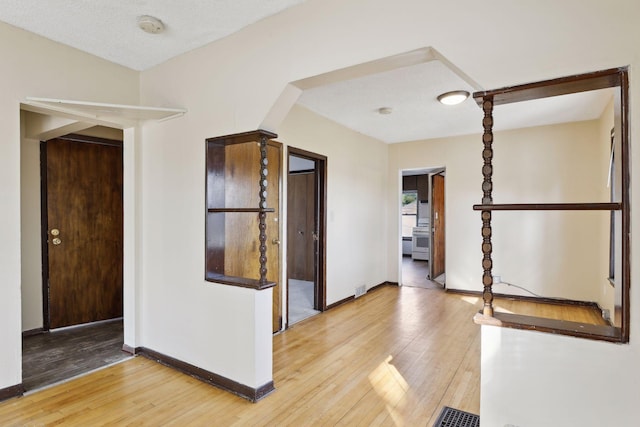 1264 Snelling Ave N, Saint Paul, MN 55108 - entrance foyer with light wood-type flooring and baseboards