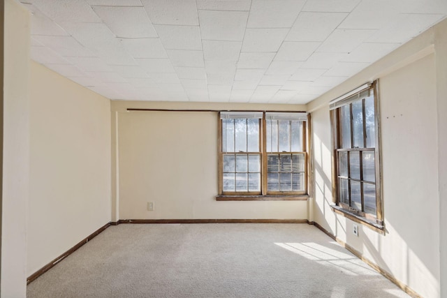 1264 Snelling Ave N, Saint Paul, MN 55108 - carpeted spare room featuring baseboards
