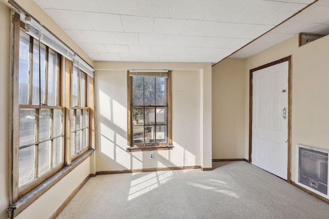 1264 Snelling Ave N, Saint Paul, MN 55108 - carpeted spare room with heating unit and baseboards