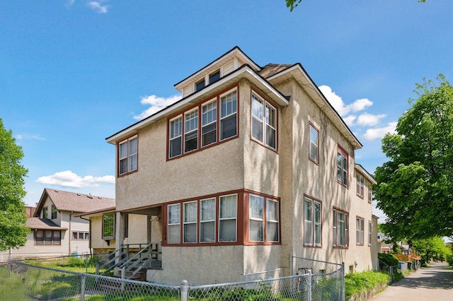 1264 Snelling Ave N, Saint Paul, MN 55108 - view of front of property with stucco siding